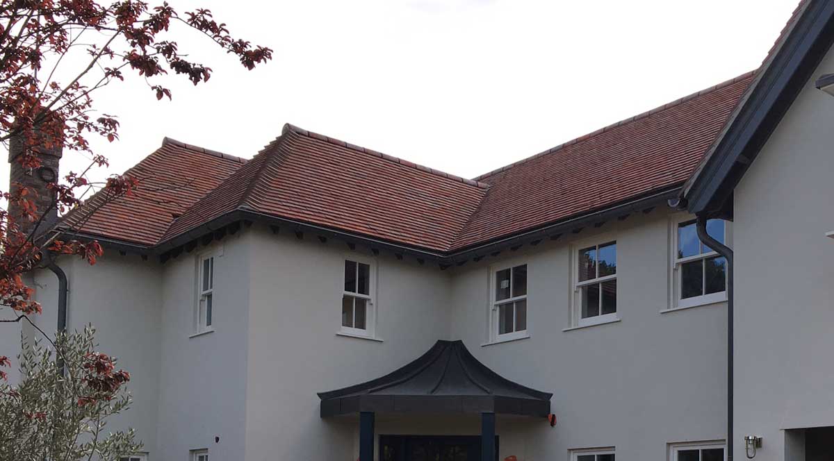 Dreadnought purple brown handmade roof tiles on a selfbuild project in Surrey