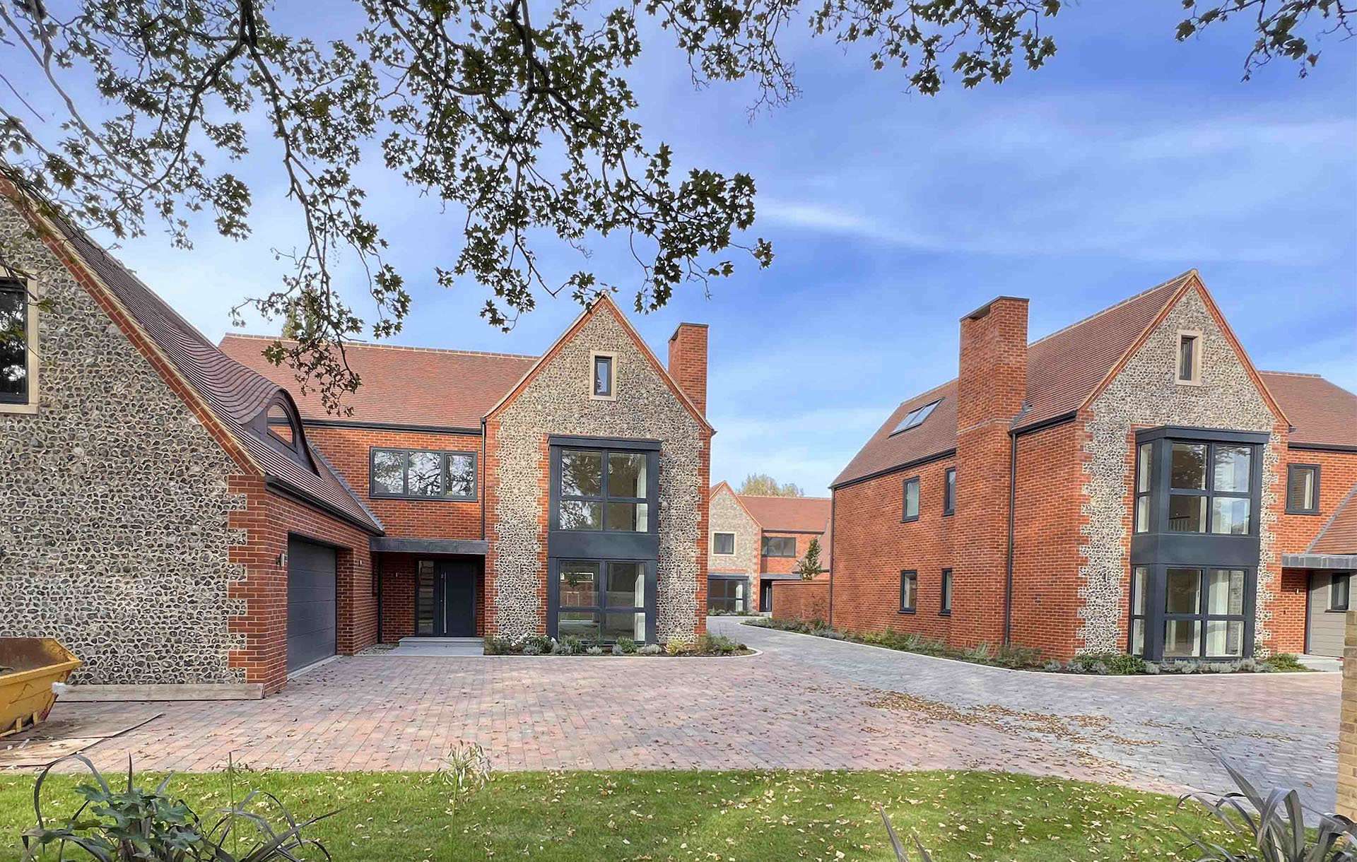 a small high end development in Cambridgeshire by NP Architects with Dreadnought sandfaced country brown tiles