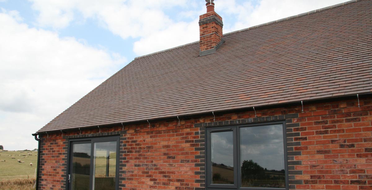 brown brindle tiles on a rural selfbuild in Shropshire