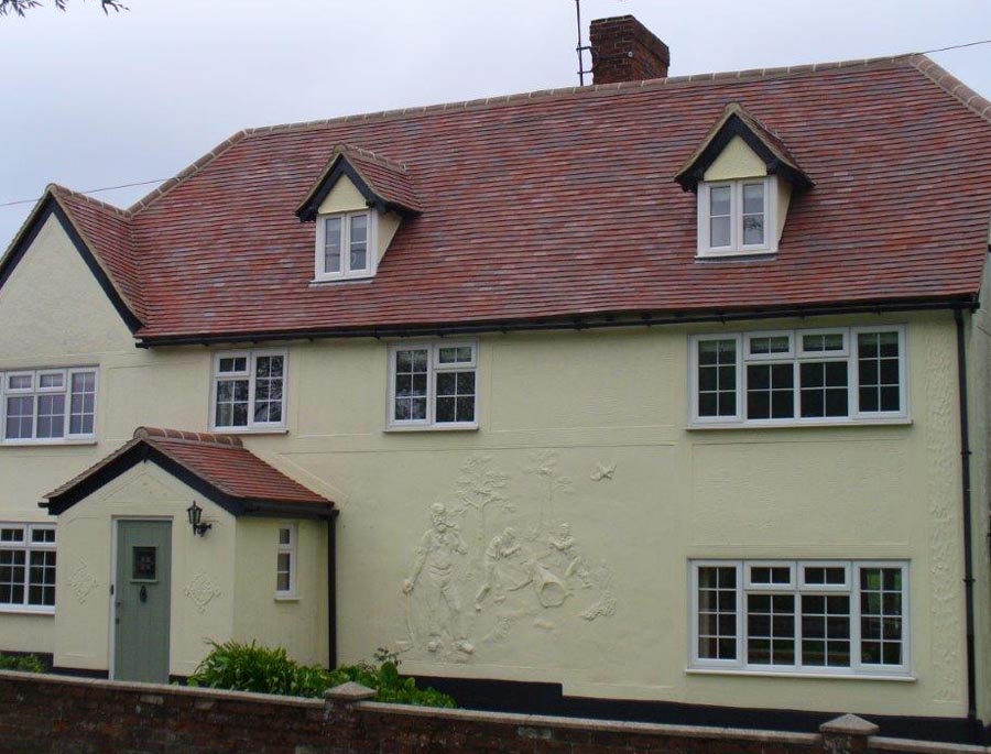 Brown Antique Rustic tiles on a house in Essex