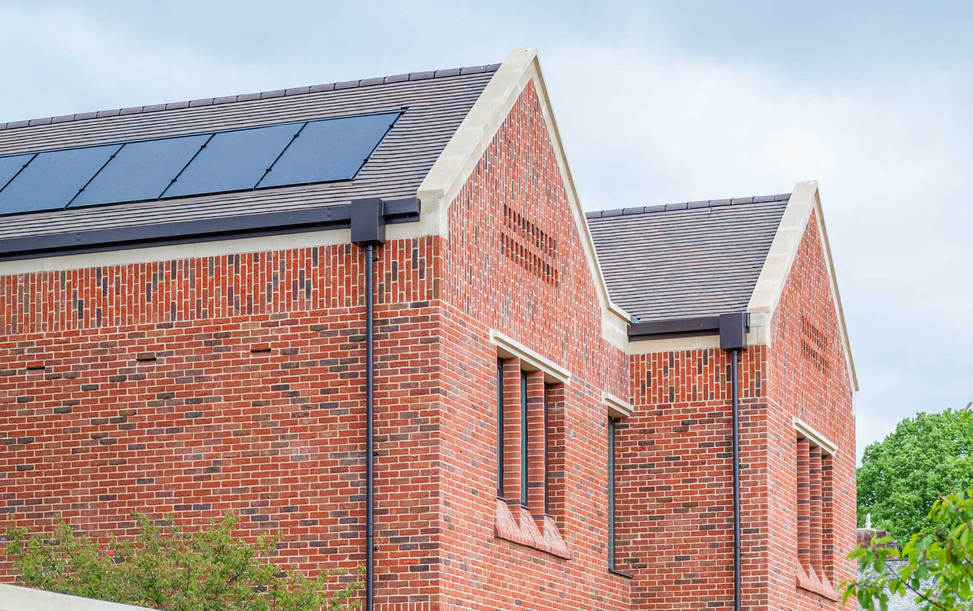 Brown heather rustic tiles at new Winchester College boarding house