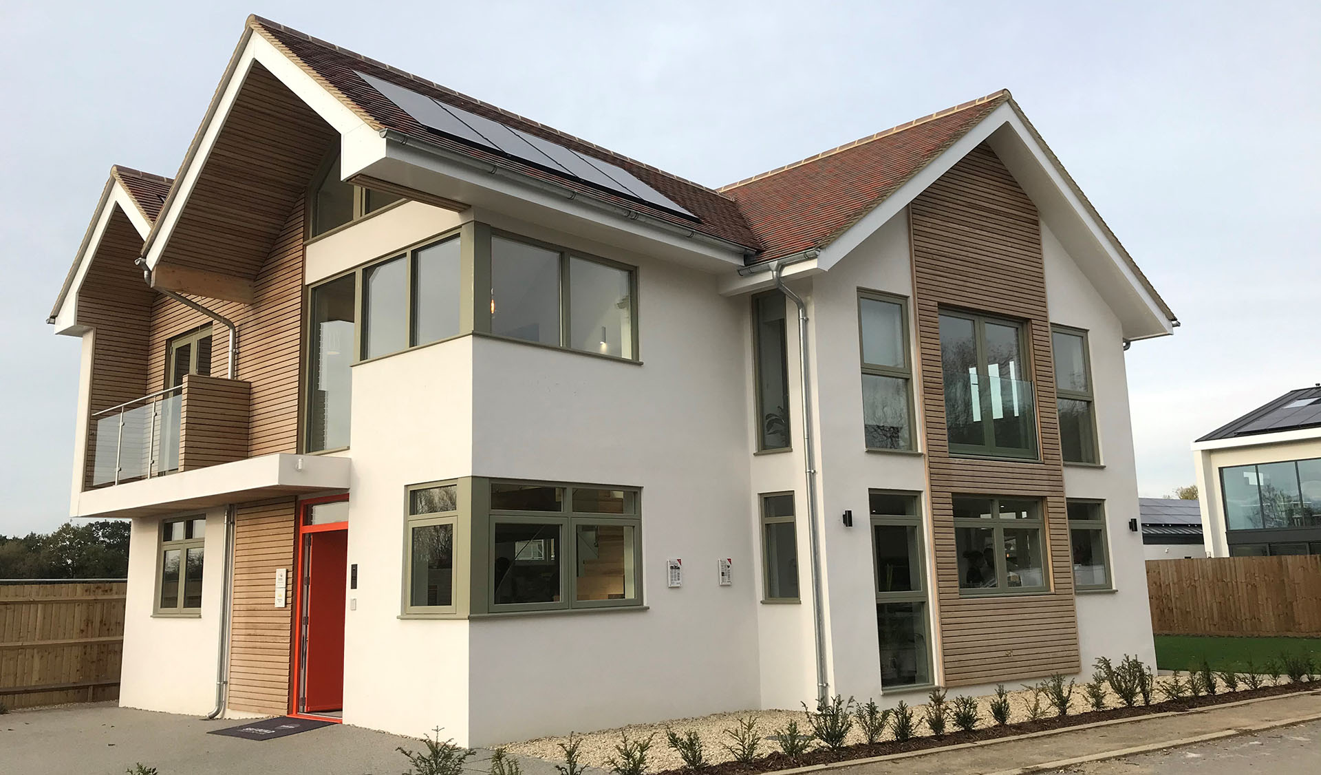 Build It House with mixed blend of red country brown and brown heather sanded tiles