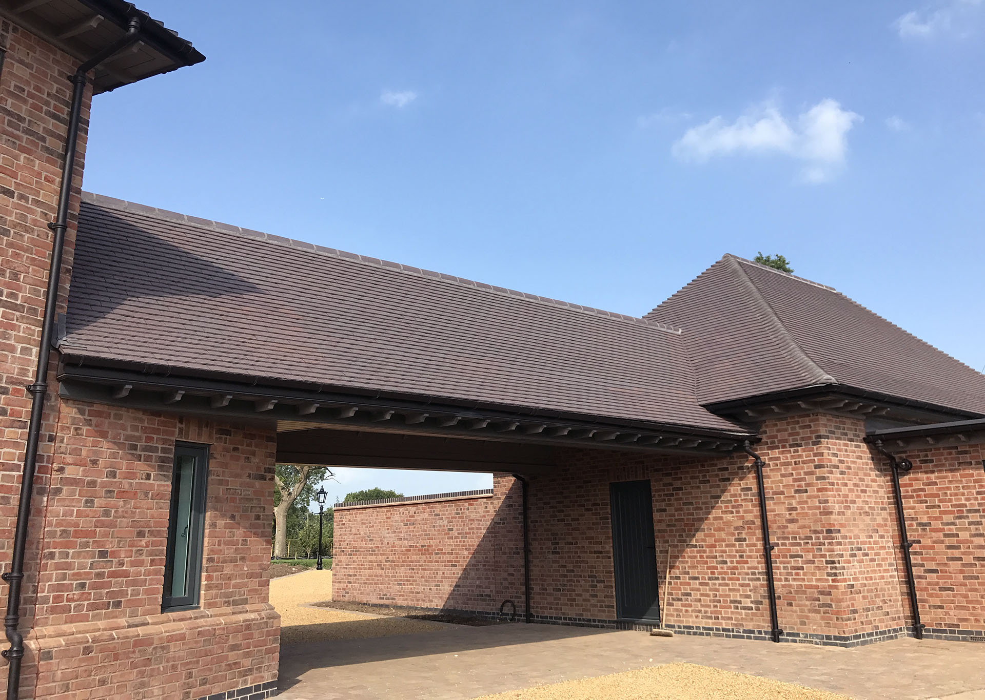 Dark heather rustic tiles on a self build in Derbyshire