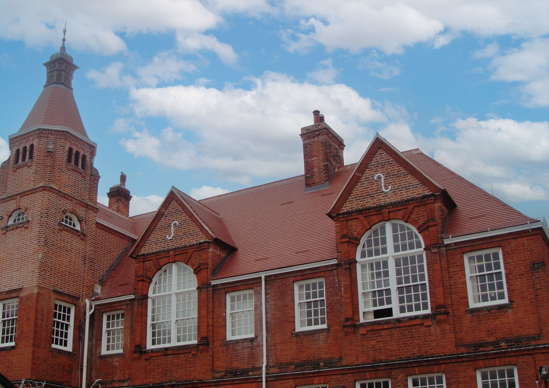 Dreadnought Plum Red tiles on a reroofing project at St Johns Green School