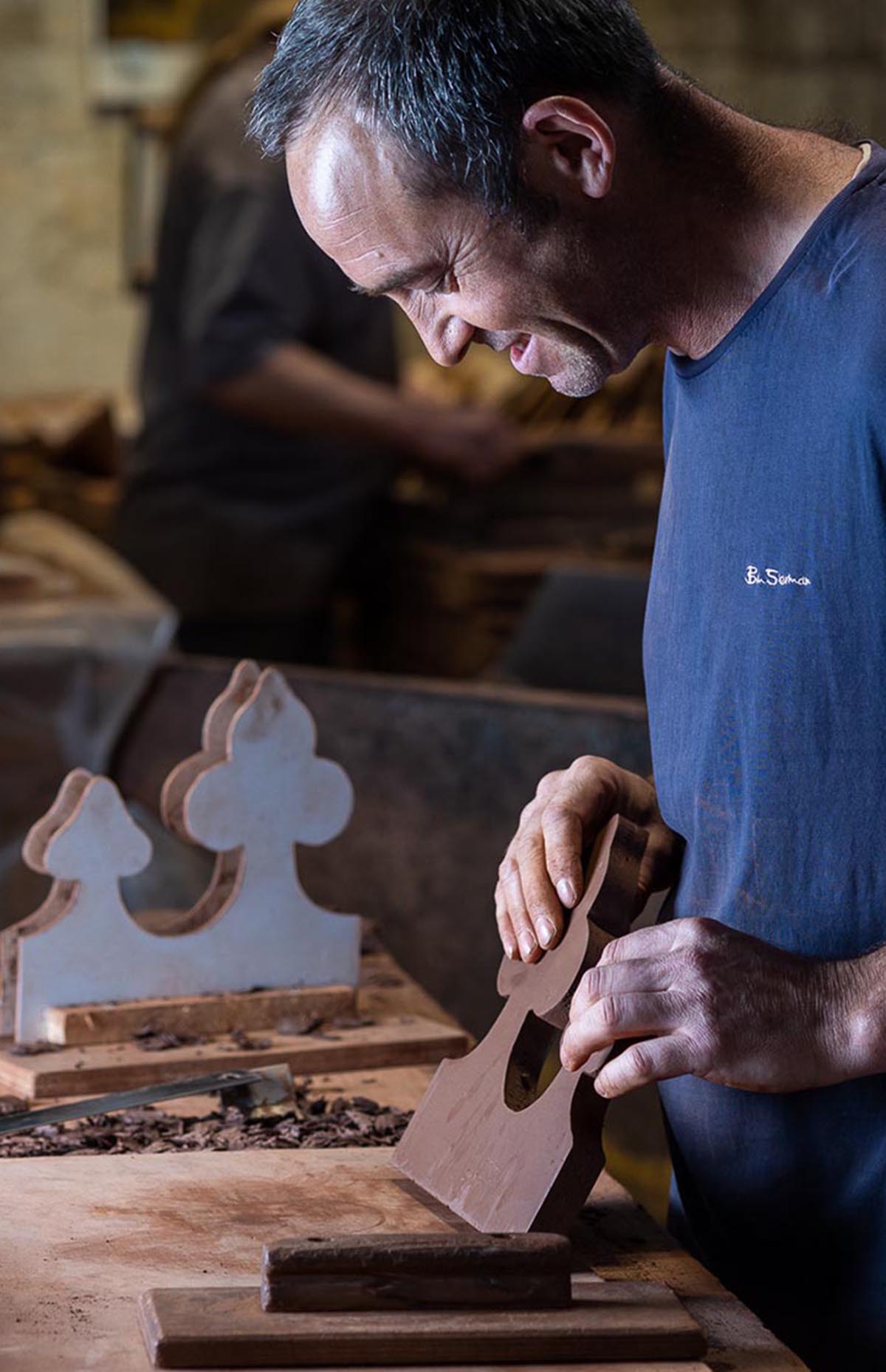 Jason making inserts for a roll top ornamental ridge