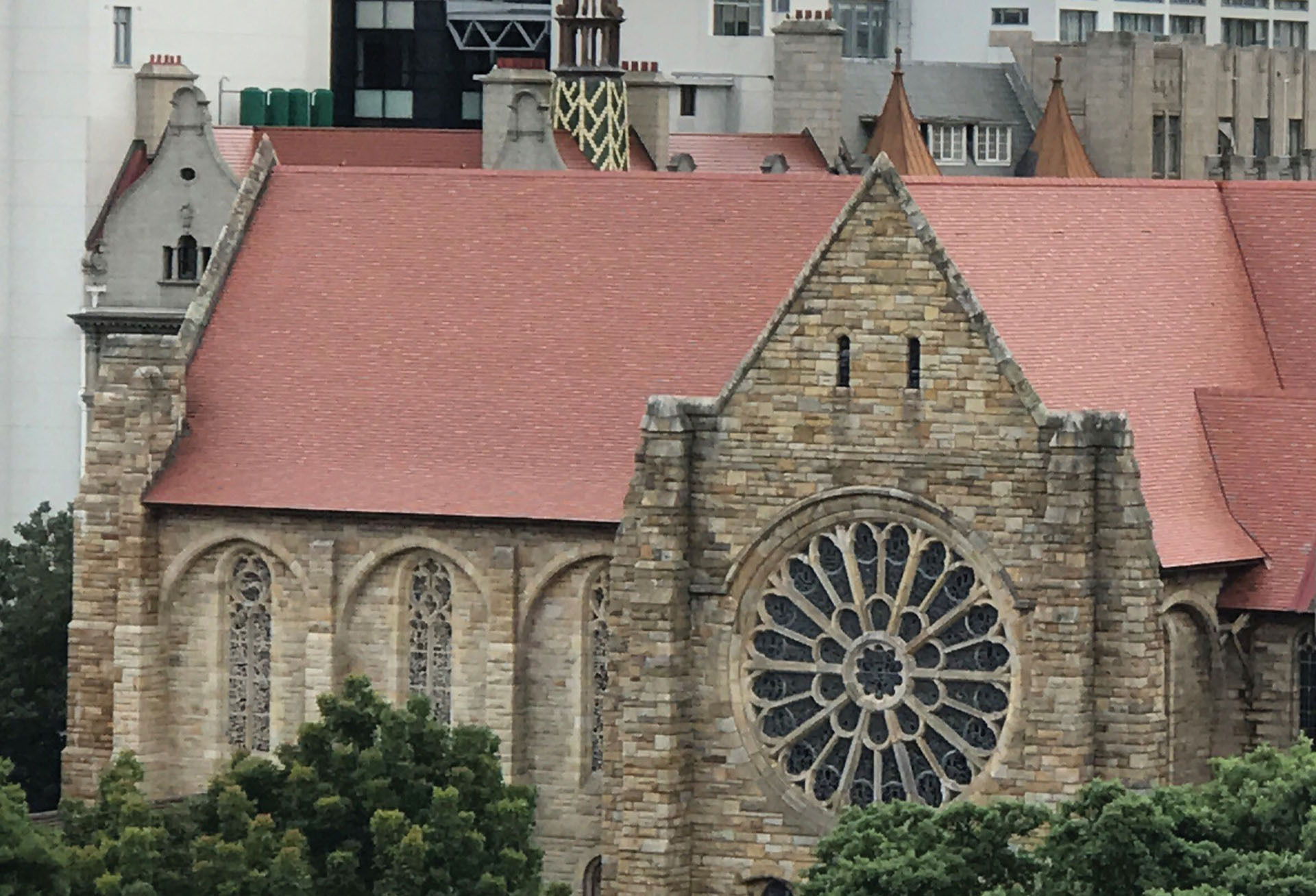 Plum red brown antique and country brown tiles reroof St Georges Cathedral in Capetown