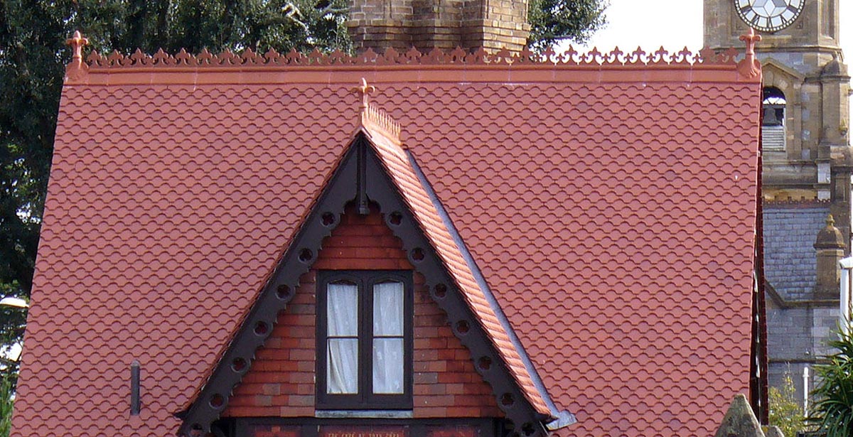 Red Ornamental Fishtail tiles were used to refurbish this Grade II listed lodge