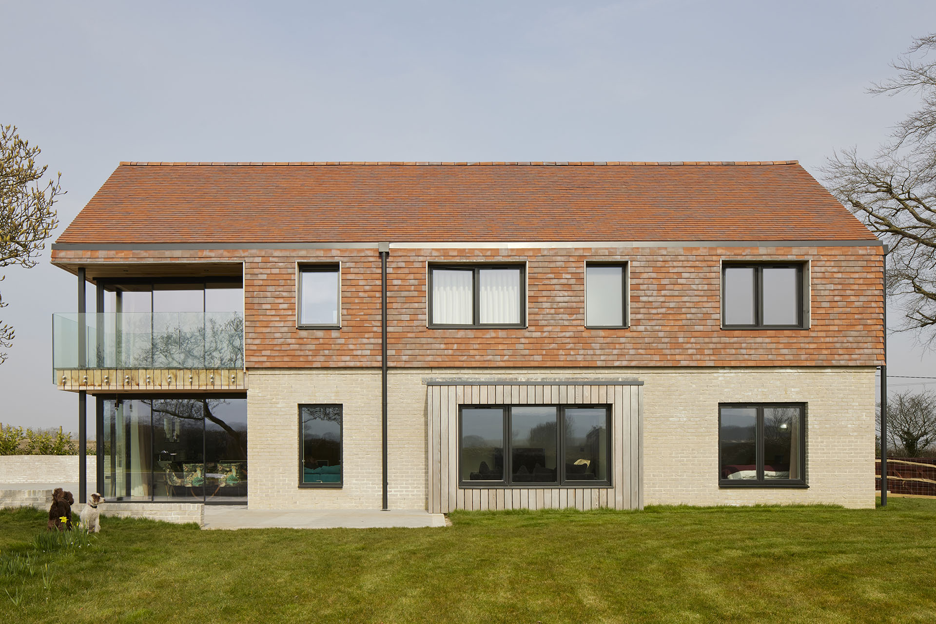 Red blue rustic tiles blend well with the tones of the East Sussex landscape