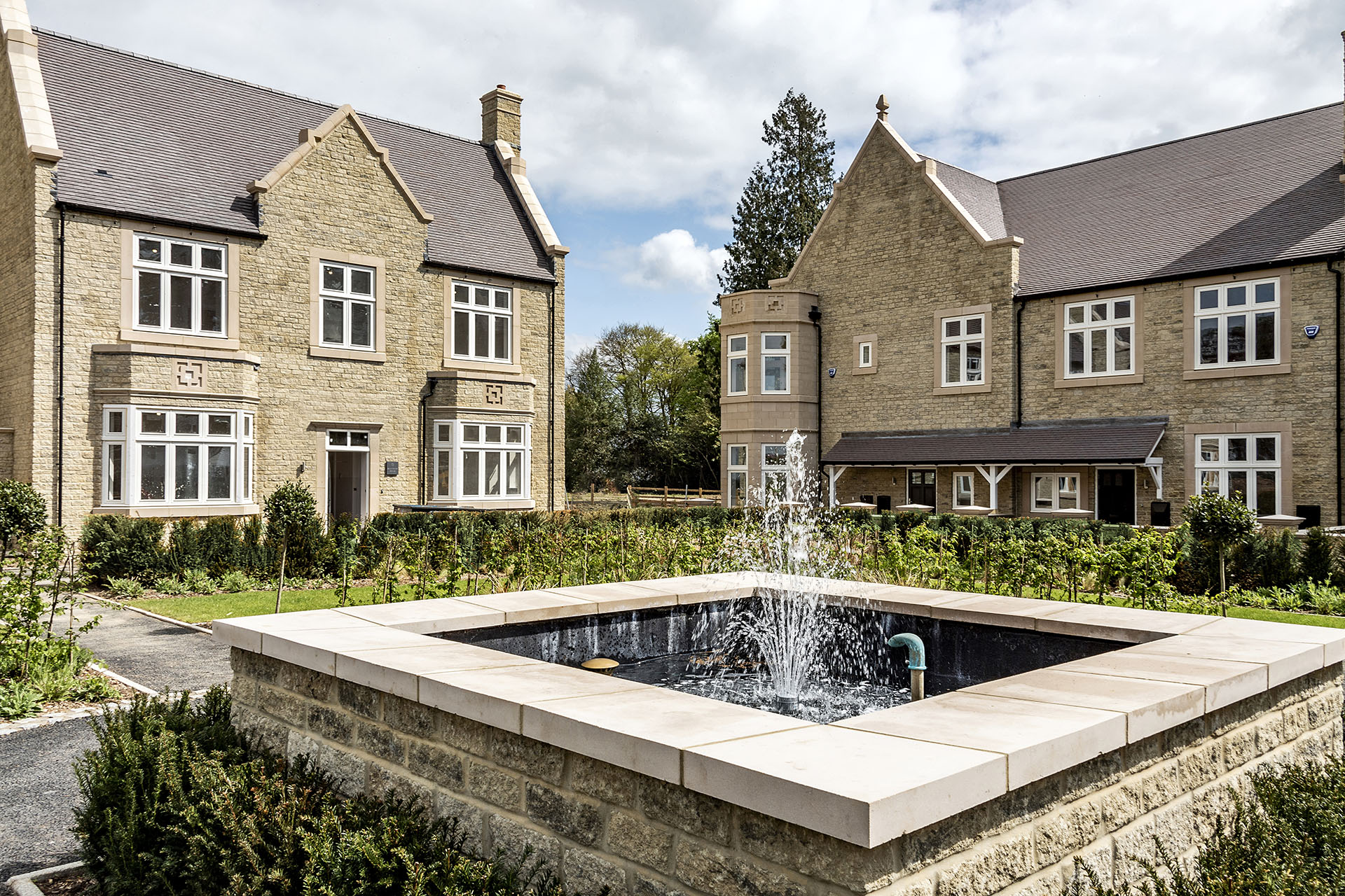 Spitfire Homes Hazeley Manor luxury development with dark heather tiles