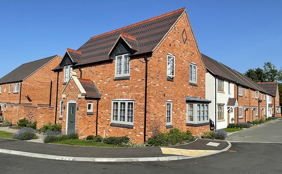 different Dreadnought roof tiles and features help to create a village feel at this new Elegant Homes developement