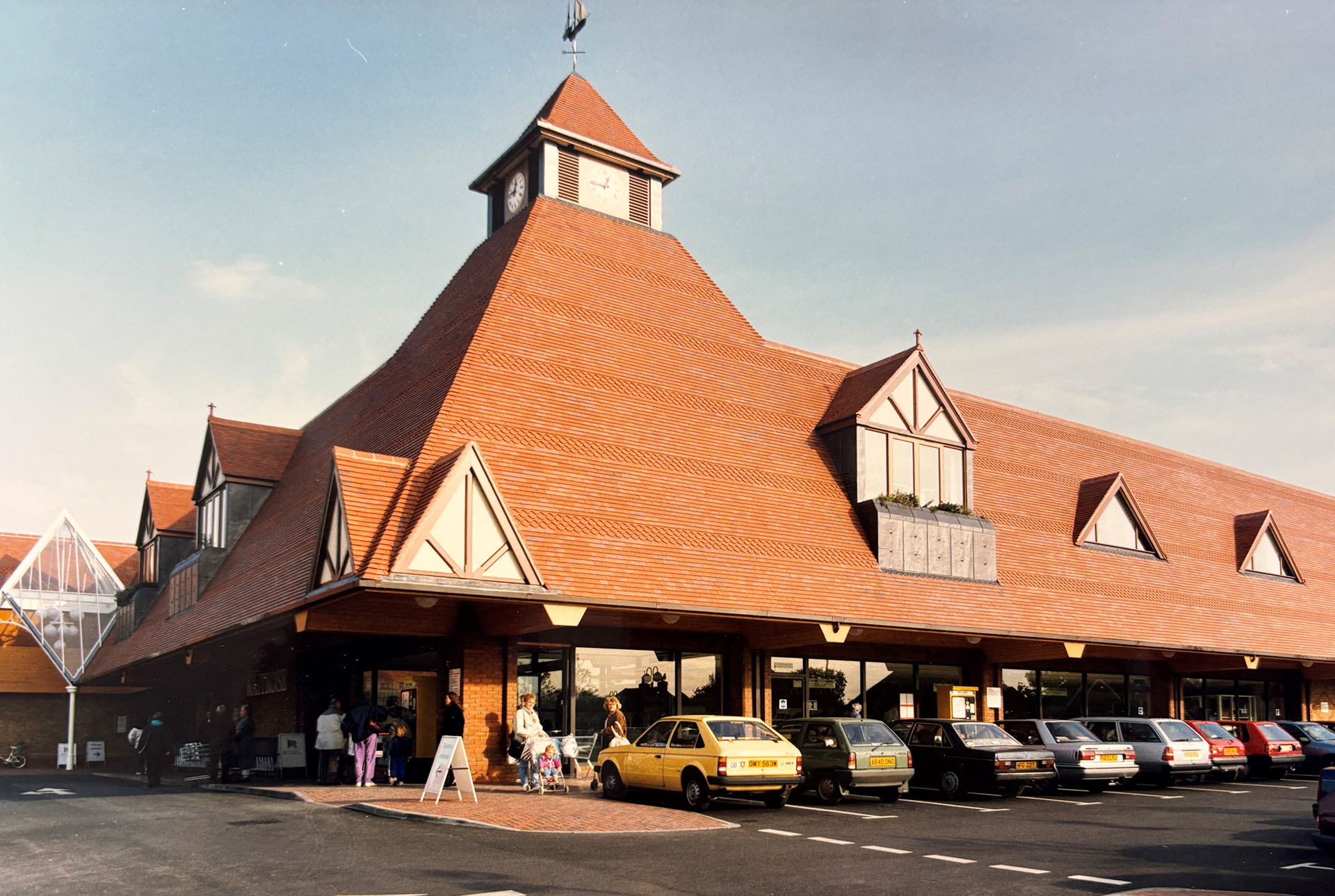 Waitrose supermarket with country brown plain tiles bands of ornamentals