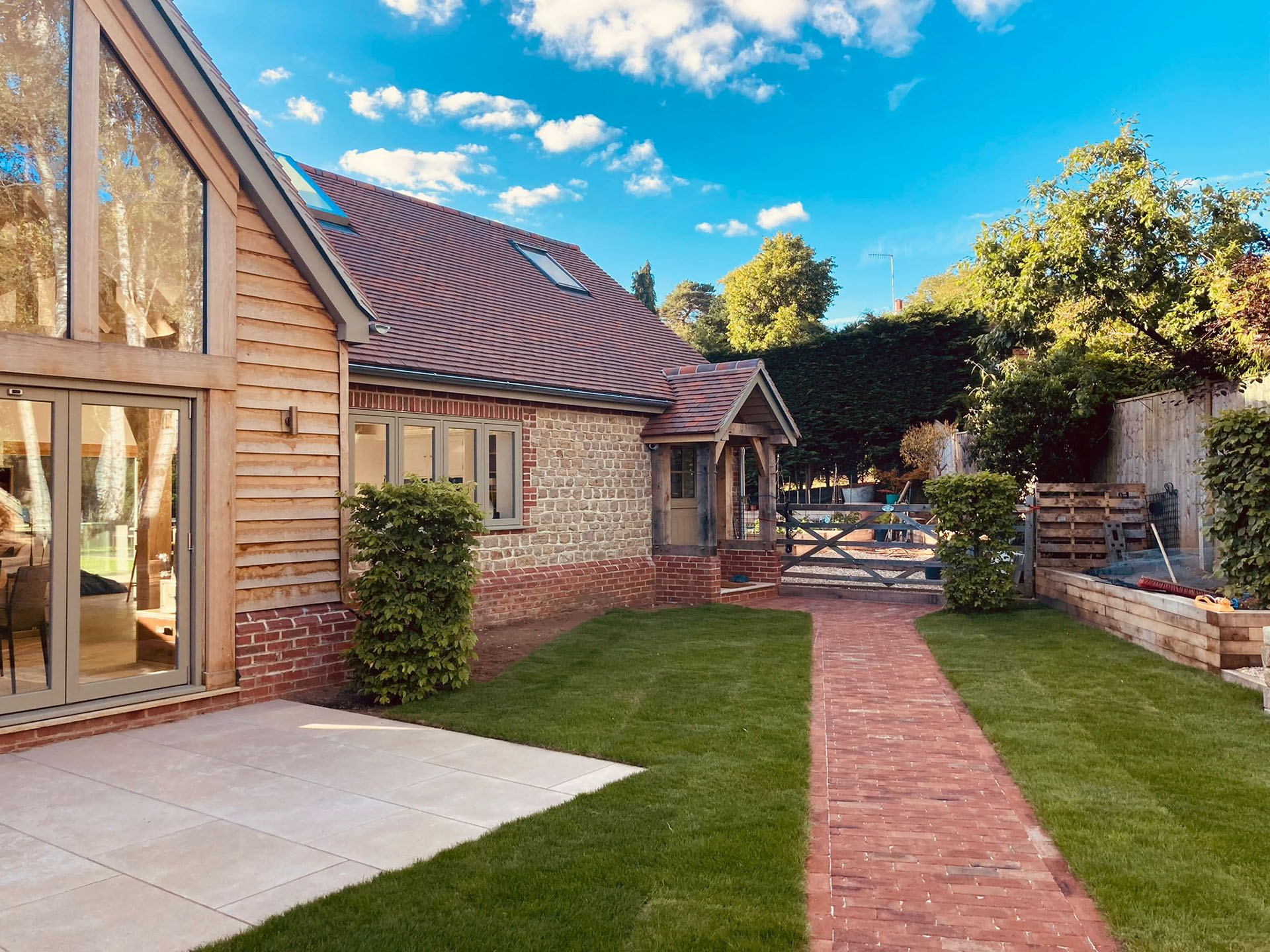 a mixed blend of bronze and purple brown handmade tiles on a residential project in Surrey