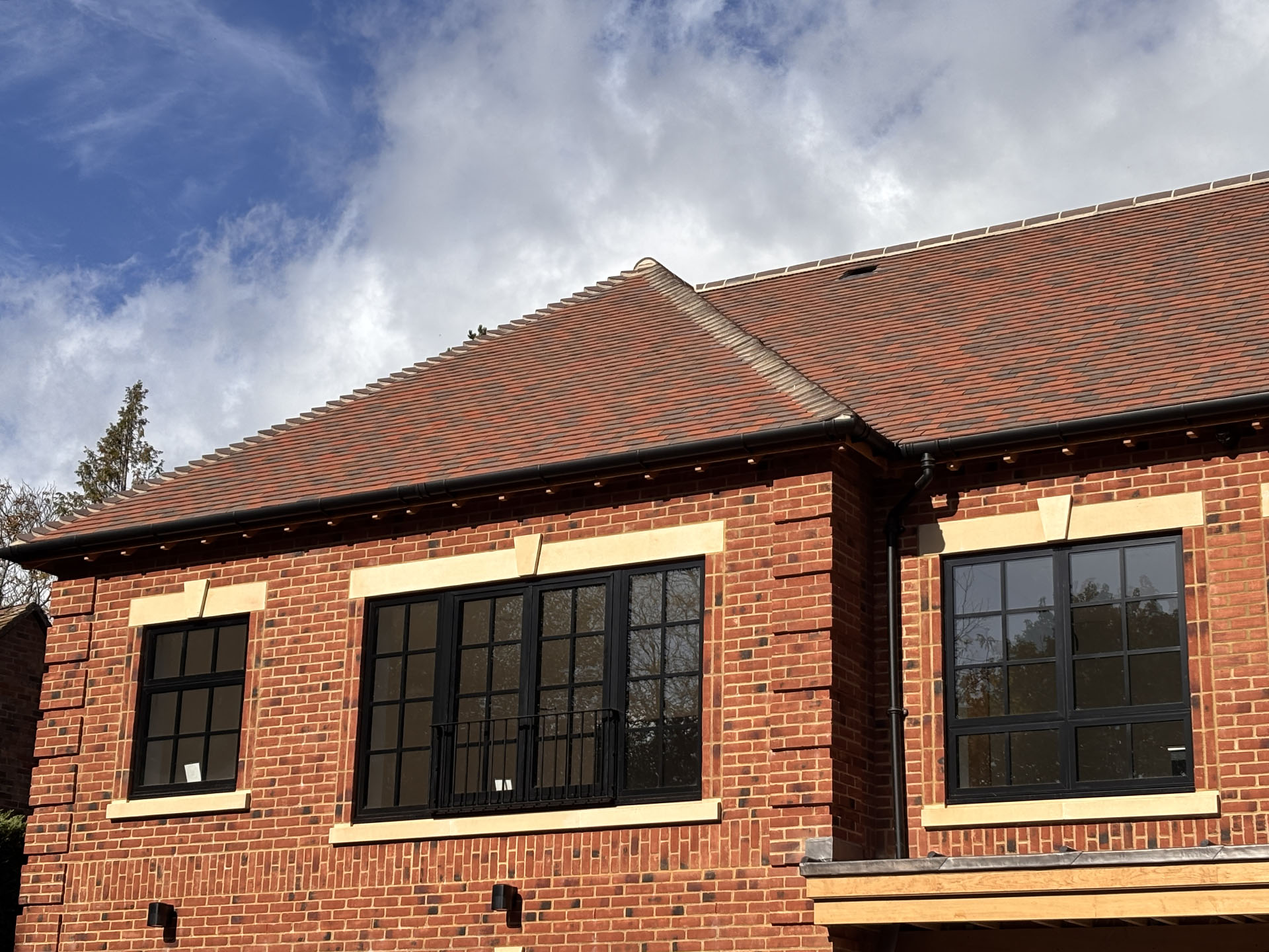 a self build home in the South with Trafalgar blend clay roof tiles