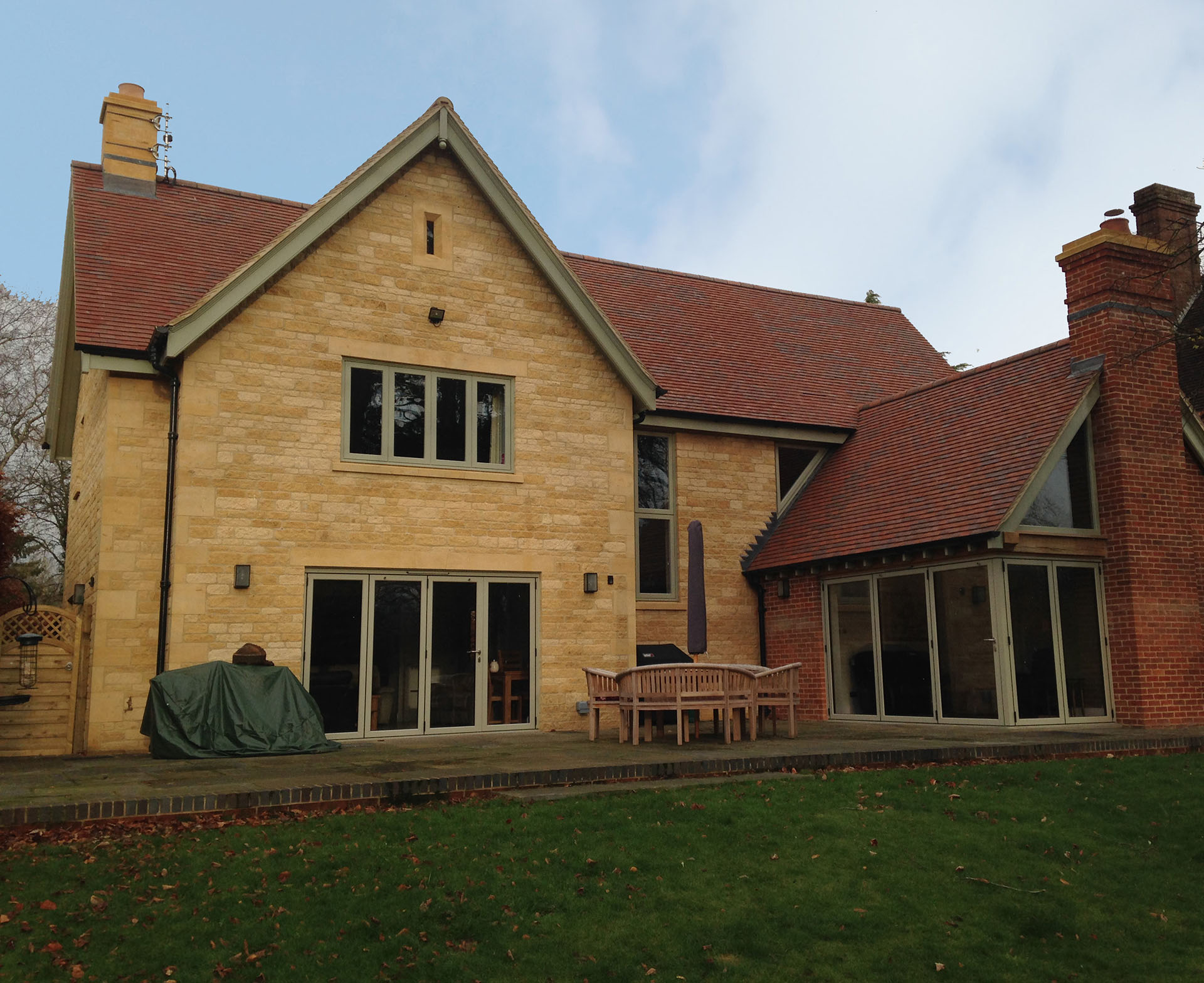 a self build in the Cotswolds with Brown Antique rustic clay roof tiles