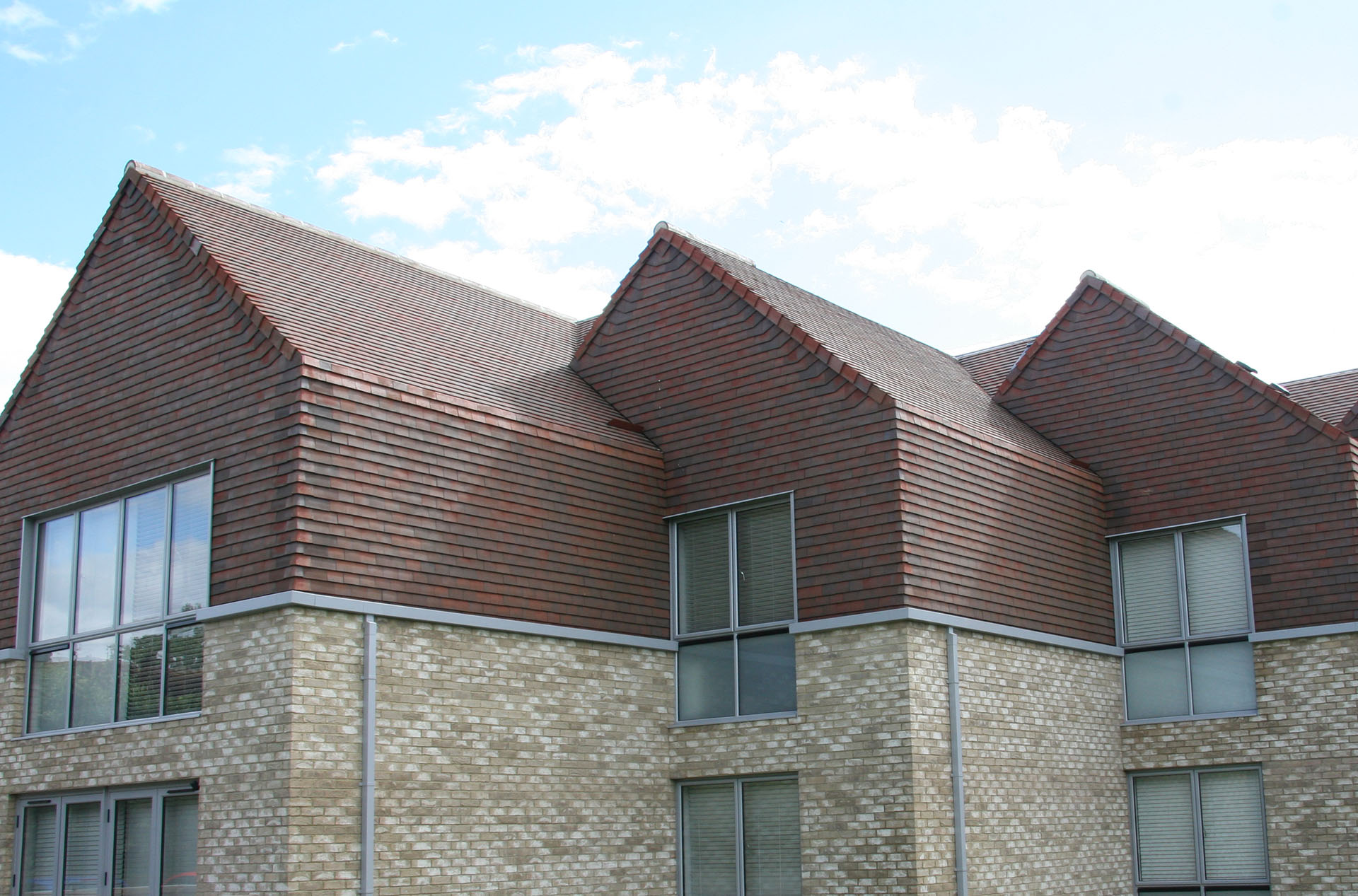 an Adrian James Architects project in Cumnor Hill with country brown tiles