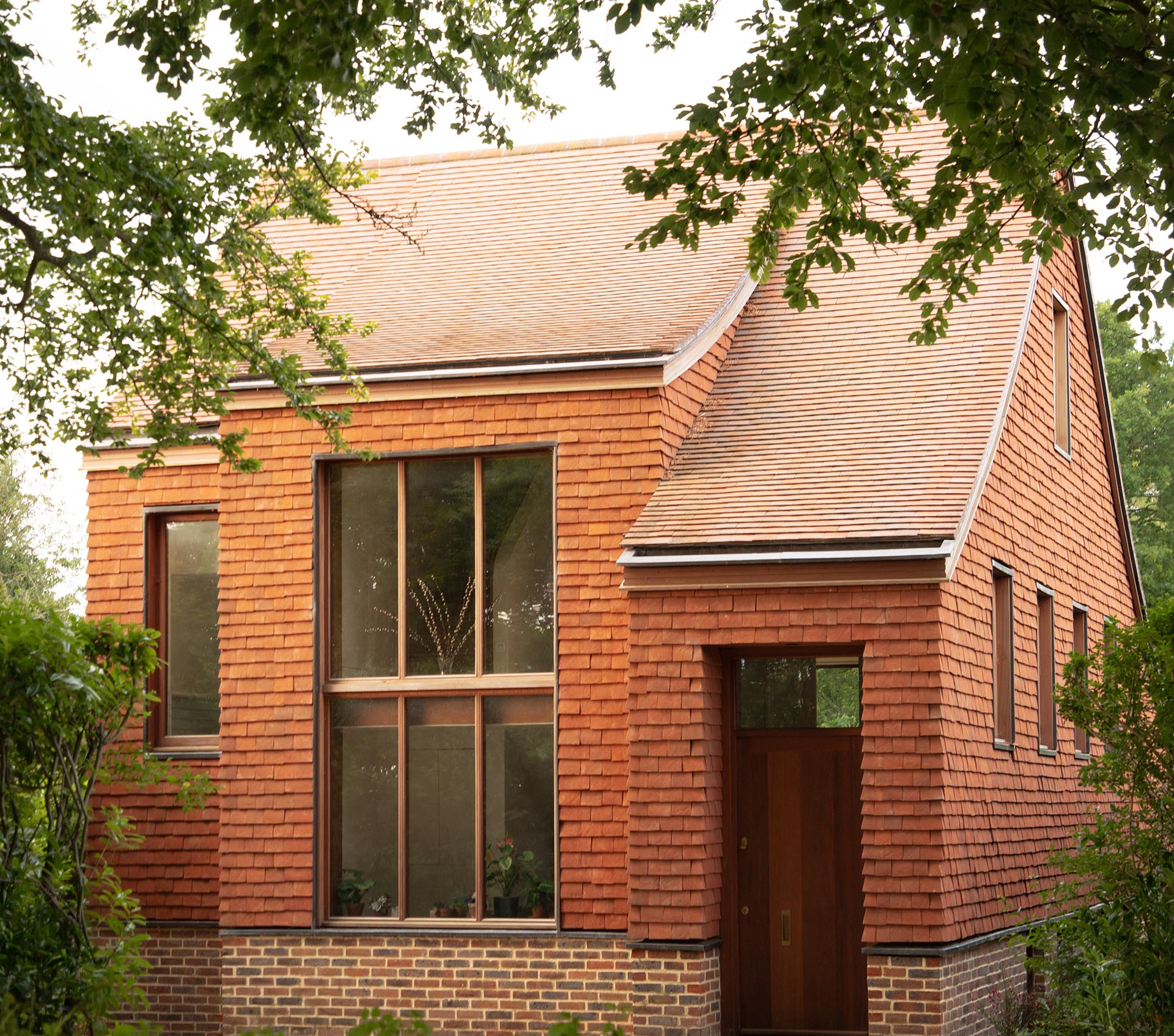 brown antique rustic tiles at the RIBA award winning Clay Rise