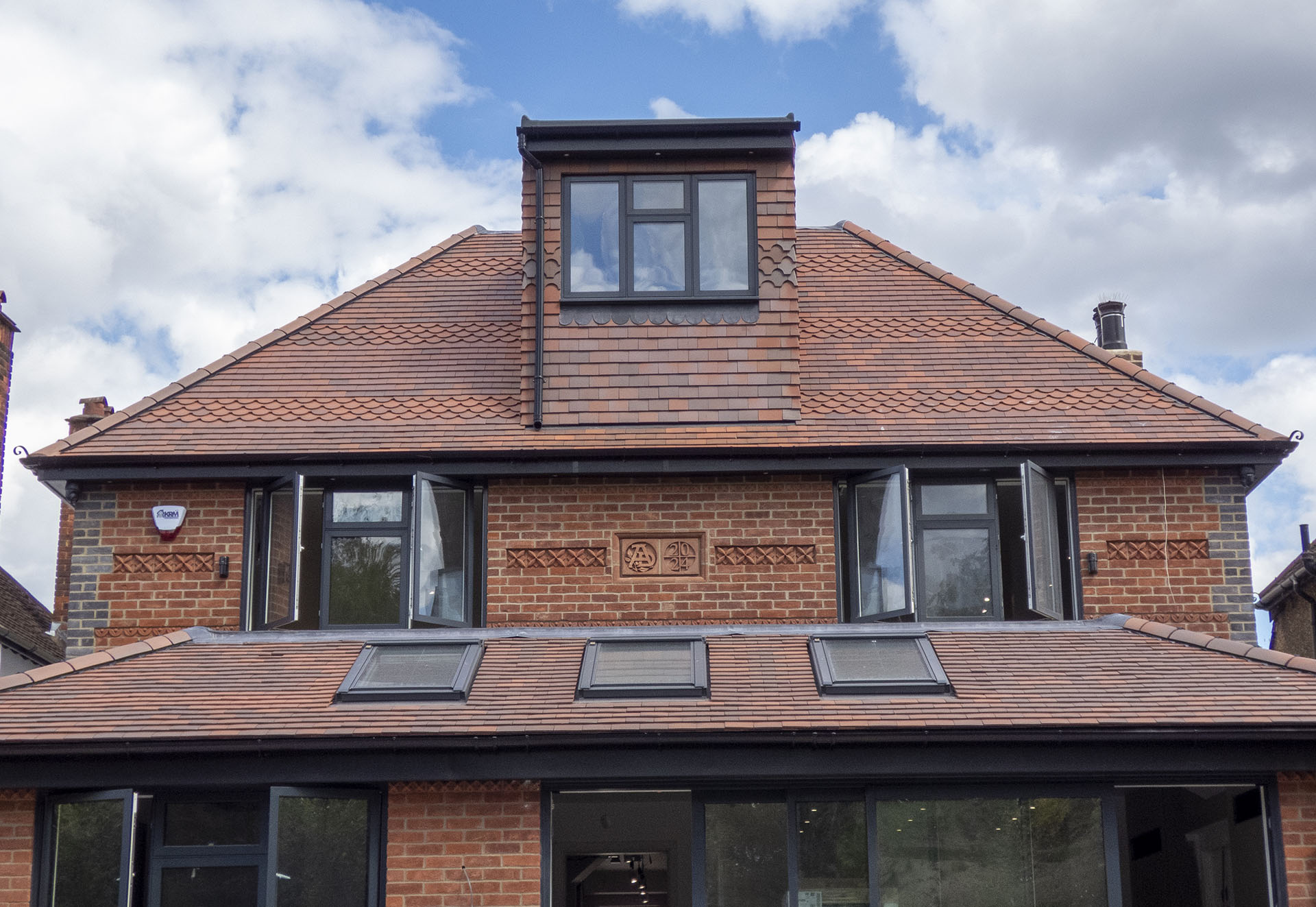 brown antique smooth tiles with bands of ornamentals
