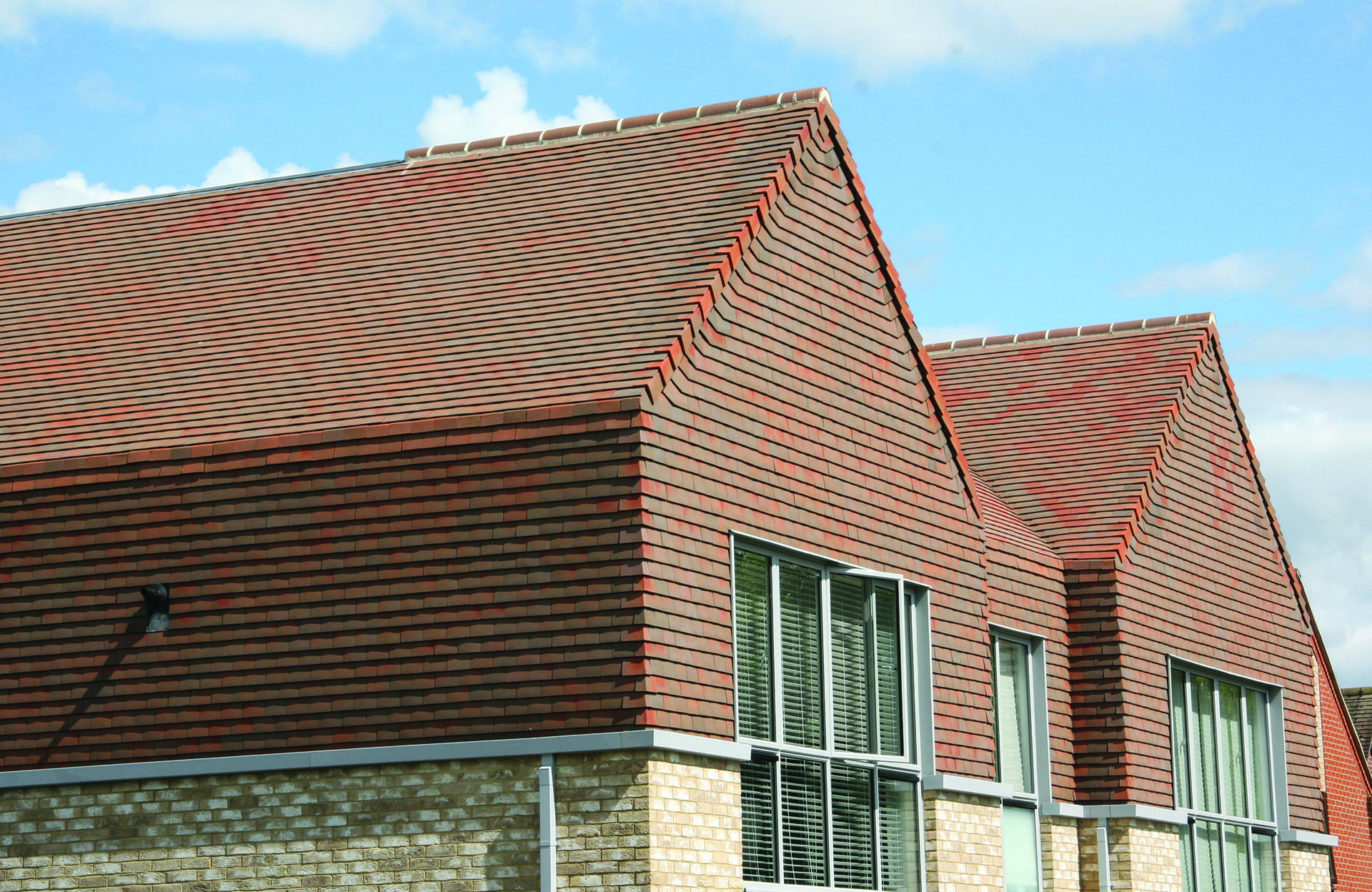 country brown tiles on the roof and verticals on a new development in Oxfordshire