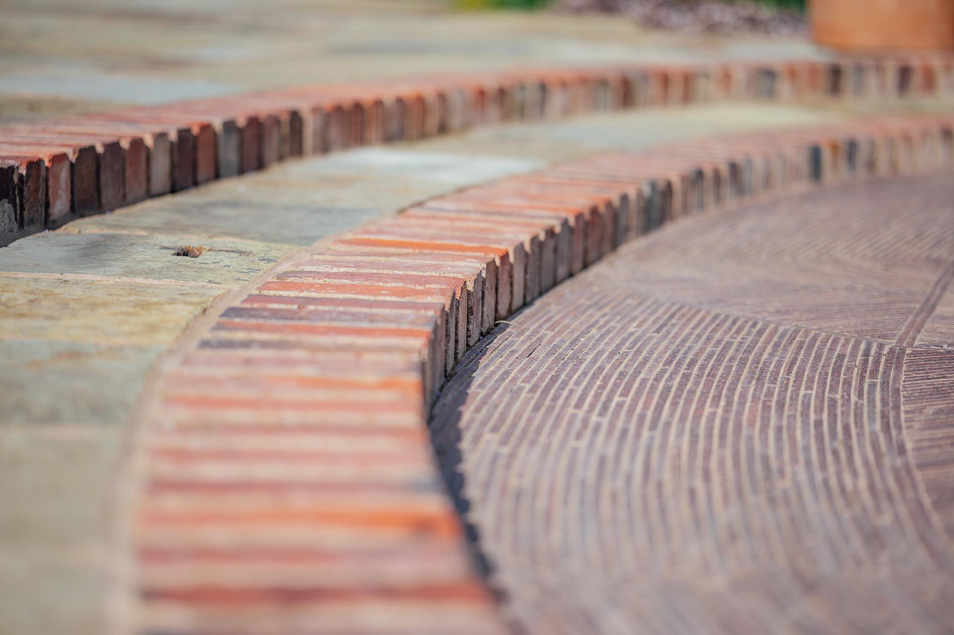 creasing tile design with York Stone patio by Avery Landscape