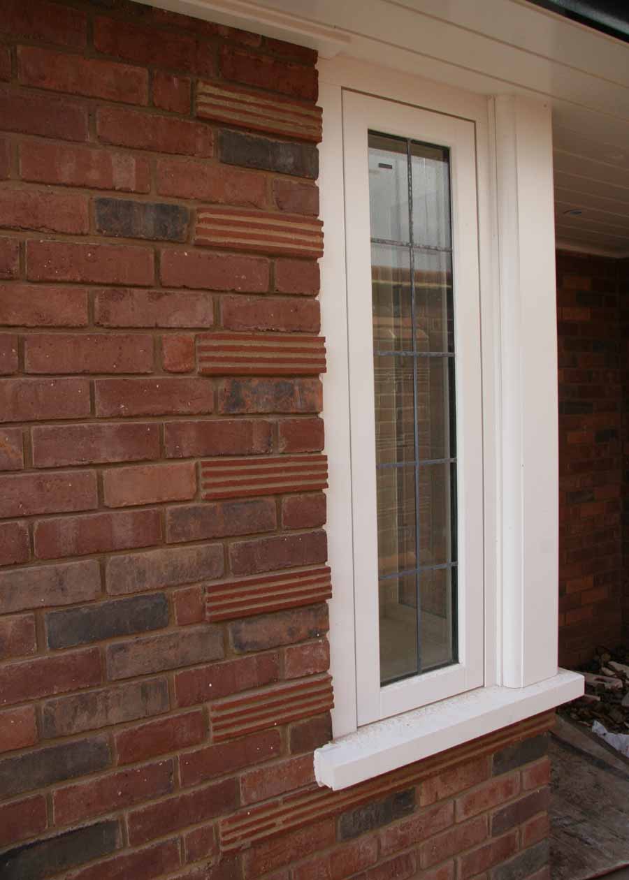 creasing tiles are used here to add detail to the brickwork around the window
