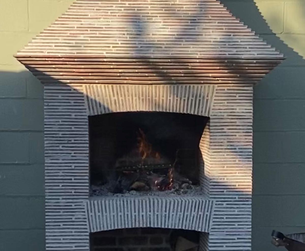 fireplace of creasing tiles by Classic Architecture