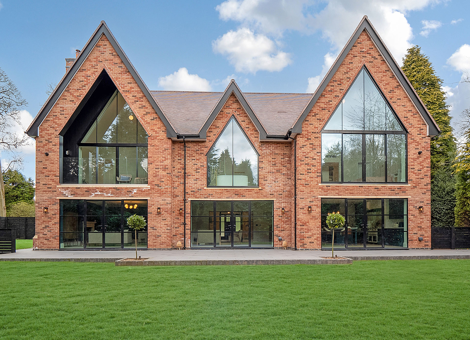 new build house by Mercia Design Build with dark heather tiles