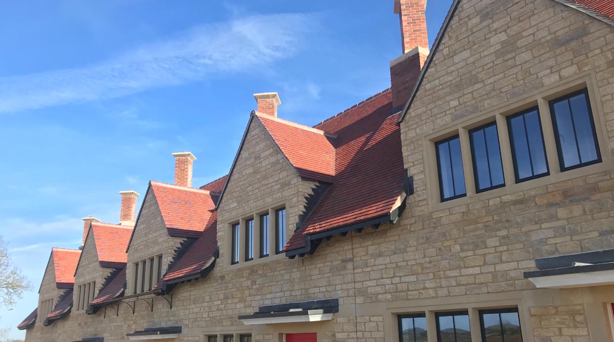 Red blue blend tiles on a small Oxfordshire development