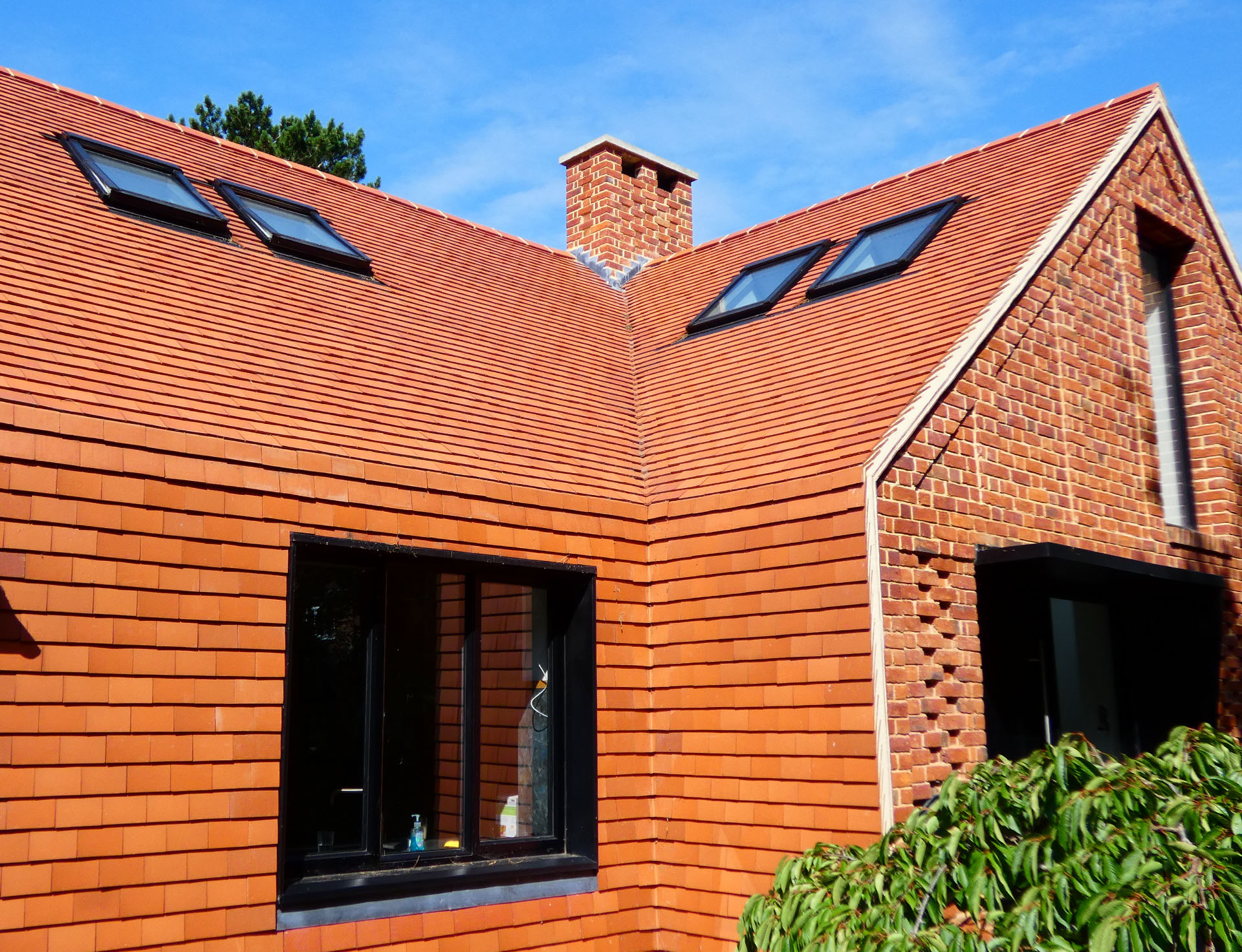 selfbuild project in Purley with Dreadnought red smooth tiles and mansards